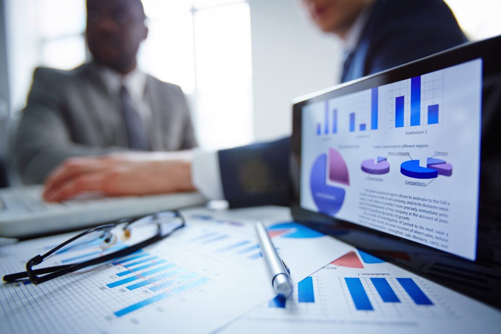 Marketing research in progress, image showing two professionals and a computer in first frame.